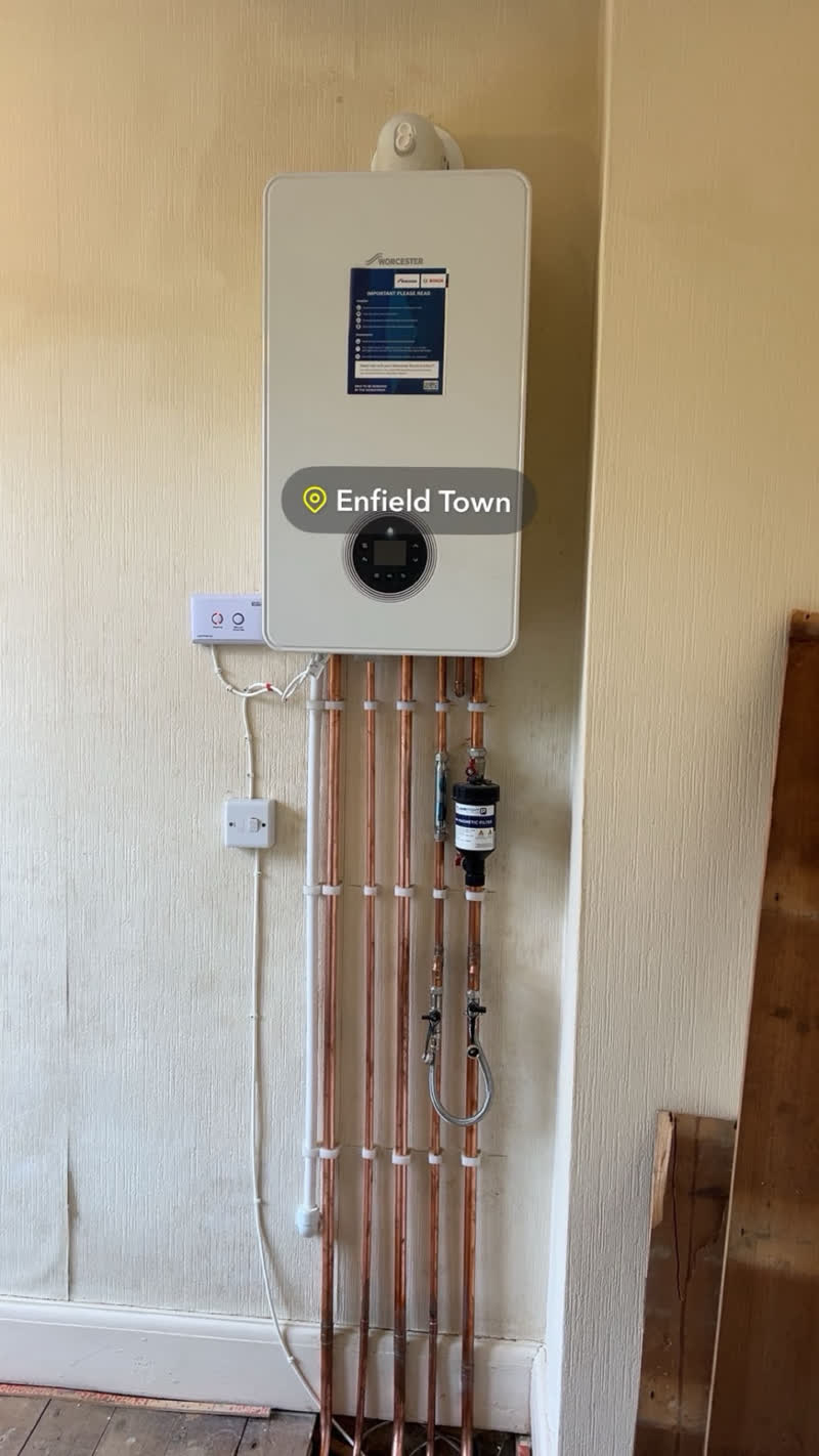Worcester Bosch boiler installation in Enfield Town with five copper pipe drops